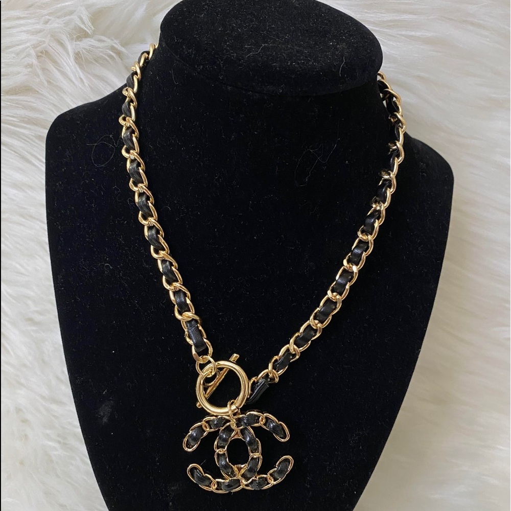 Gold tone with black necklace